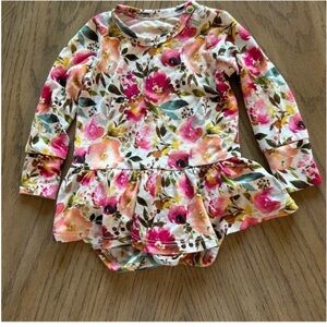 Vibrant Pink and Green Floral Bodysuit with Artistic Blooms